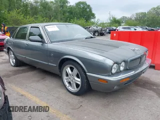 2002 Jaguar XJ with VIN SAJDA12CX2LF49531, listed as a IAAI auction lot 42124743 with 120,486 mi miles. Bid and sale history available at carsss.com. Image 1.