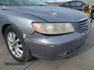 2006 Hyundai Azera SE with VIN KMHFC46F06A121940, listed as a IAAI auction lot 41707660 with 209,461 mi miles and . Bid and sale history available at DreamBid. Image 6.