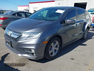 2018 Honda Odyssey EX-L z VIN 5FNRL6H7XJB067694, wystawiony jako IAAI lot #42177338 z przebiegiem 159 670 mil mil oraz . Historia ofert i sprzedaży dostępna na DreamBid. Obrazek 2.
