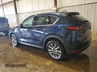 2020 Mazda CX-5 Grand Touring with VIN JM3KFBDM1L0860873, listed as a Copart auction lot 55463335 with 85,810 mi miles and Salvage Title. Bid and sale history available at DreamBid. Image 2.