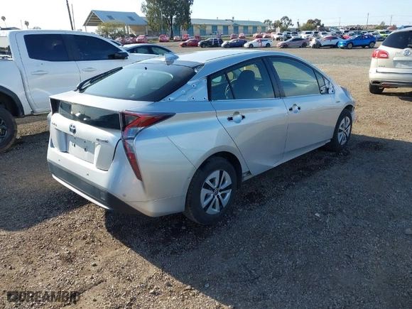 2018 Toyota Prius Two with VIN JTDKBRFUXJ3070977, listed as a IAAI auction lot 41944435 with 128,117 mi miles. Bid and sale history available at carsss.com. Image 4.