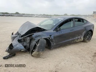 2023 Tesla Model 3 z VIN 5YJ3E1EA2PF449486, wystawiony jako Copart lot #51703475 z przebiegiem 33 061 mil mil oraz Szkoda całkowita • Salvage title. Historia ofert i sprzedaży dostępna na DreamBid. Obrazek 1.