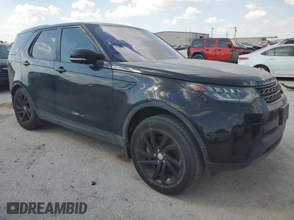 2018 Land Rover Discovery HSE with VIN SALRR2RV3JA051990, listed as a Copart auction lot 74060534 with 104,086 mi miles and Salvage Title. Bid and sale history available at carsss.com. Image 4.