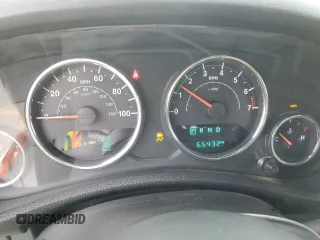 2016 Jeep Wrangler Rubicon z VIN 1C4BJWCG7GL293843, wystawiony jako Copart lot #71455124 z przebiegiem 65 432 mil mil oraz Szkoda całkowita • Salvage title. Historia ofert i sprzedaży dostępna na DreamBid. Obrazek 9.