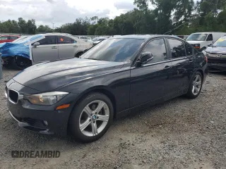 2013 BMW 3 Series 328i with VIN WBA3A5G57DNP25903, listed as a Copart auction lot 62056675 with 114,036 mi miles and Salvage title. Bid and sale history available at DreamBid. Image 1.