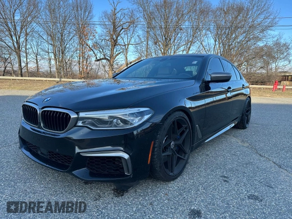 2018 BMW 5 Series M550i xDrive with VIN WBAJB9C55JB035226, listed as a Copart auction lot 57062675 with 156,183 mi miles and Clean title. Bid and sale history available at DreamBid. Image 2.