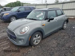 2016 MINI Hardtop 4 Door with VIN WMWXU1C53G2D08231, listed as a Copart auction lot 61050035 with 128,267 mi miles and Salvage title. Bid and sale history available at DreamBid. Image 1.