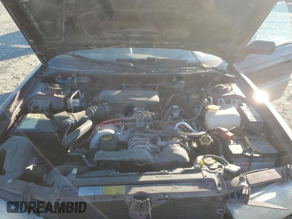 1999 Subaru Legacy Outback z VIN 4S3BG6853X7603582, wystawiony jako Copart lot #42632735 z przebiegiem 183 424 mil mil oraz Szkoda całkowita • Salvage title. Historia ofert i sprzedaży dostępna na DreamBid. Obrazek 11.