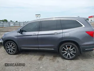 2019 Honda Pilot Touring 8-Passenger with VIN 5FNYF5H93KB028641, listed as a IAAI auction lot 42524078 with 56,744 mi miles and . Bid and sale history available at DreamBid. Image 15.