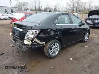 2012 Chevrolet Sonic LT with VIN 1G1JC5SH0C4129096, listed as a IAAI auction lot 42023621 with 45,517 mi miles and . Bid and sale history available at DreamBid. Image 4.