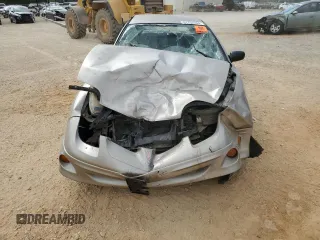 2002 Pontiac Sunfire SE z VIN 1G2JB524027308408, wystawiony jako Copart lot #61752784 z przebiegiem Nie podano mil oraz Szkody całkowita. Historia ofert i sprzedaży dostępna na DreamBid. Obrazek 5.