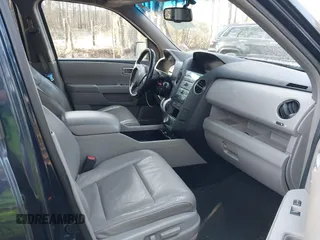2009 Honda Pilot Touring with VIN 5FNYF48939B007471, listed as a IAAI auction lot 41683495 with 189,806 mi miles and . Bid and sale history available at carsss.com. Image 5.