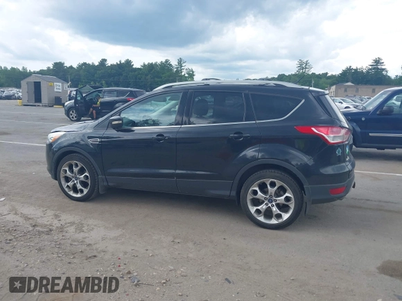 2015 Ford Escape Titanium with VIN 1FMCU9J92FUA96987, listed as a IAAI auction lot 42678423 with 188,956 mi miles and . Bid and sale history available at DreamBid. Image 14.