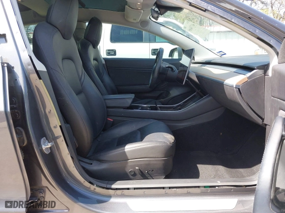 2018 Tesla Model 3 Long Range Battery with VIN 5YJ3E1EA4JF157782, listed as a IAAI auction lot 41774169 with 123,239 mi miles. Bid and sale history available at carsss.com. Image 5.