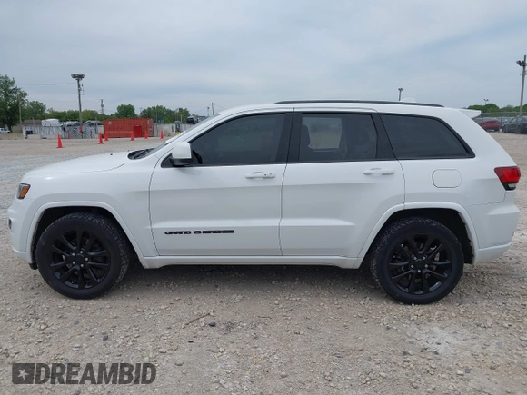 2018 Jeep Grand Cherokee Altitude with VIN 1C4RJFAG6JC164906, listed as a IAAI auction lot 42302611 with 81,447 mi miles and . Bid and sale history available at DreamBid. Image 15.