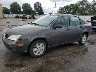 2007 Ford Focus S z VIN 1FAHP34N27W144992, wystawiony jako Copart lot #65571385 z przebiegiem 194 933 mil mil oraz Szkoda całkowita • Salvage title. Historia ofert i sprzedaży dostępna na DreamBid. Obrazek 1.