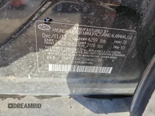 2013 Hyundai Sonata SE z VIN 5NPEC4AC5DH660721, wystawiony jako Copart lot #41617025 z przebiegiem 193 006 mil mil oraz Szkoda całkowita • Salvage title. Historia ofert i sprzedaży dostępna na DreamBid. Obrazek 12.
