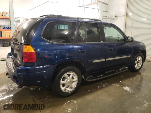 2003 GMC Envoy SLT with VIN 1GKDT13S132184373, listed as a Copart auction lot 46138705 with 130,612 mi miles and Salvage Title. Bid and sale history available at carsss.com. Image 3.