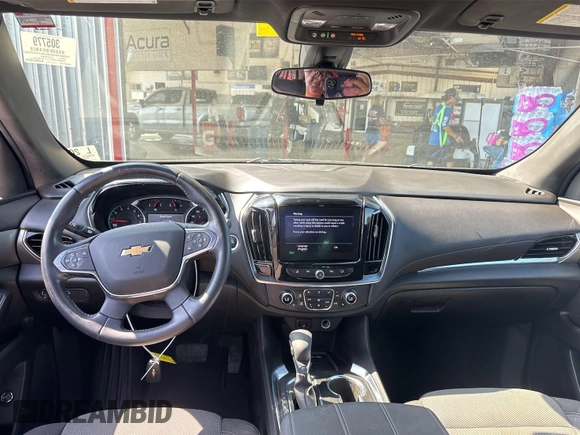 2022 Chevrolet Traverse LT Cloth with VIN 1GNERGKW3NJ157293, listed as a IAAI auction lot 42580763 with 102,743 mi miles and . Bid and sale history available at DreamBid. Image 14.