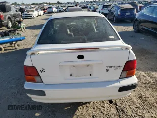 1995 Toyota Tercel DX z VIN JT2EL56D0S0108750, wystawiony jako Copart lot #75322364 z przebiegiem 200 116 mil mil oraz Szkody całkowita. Historia ofert i sprzedaży dostępna na DreamBid. Obrazek 6.