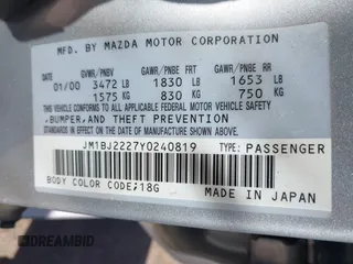 2000 Mazda Protege DX with VIN JM1BJ2227Y0240819, listed as a IAAI auction lot 41810228 with 68,650 mi miles and . Bid and sale history available at DreamBid. Image 9.