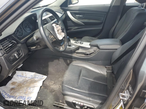 2013 BMW 3 Series 328i with VIN WBA3A5C50DF604212, listed as a Copart auction lot 62557915 with Not provided miles and Salvage title. Bid and sale history available at DreamBid. Image 7.