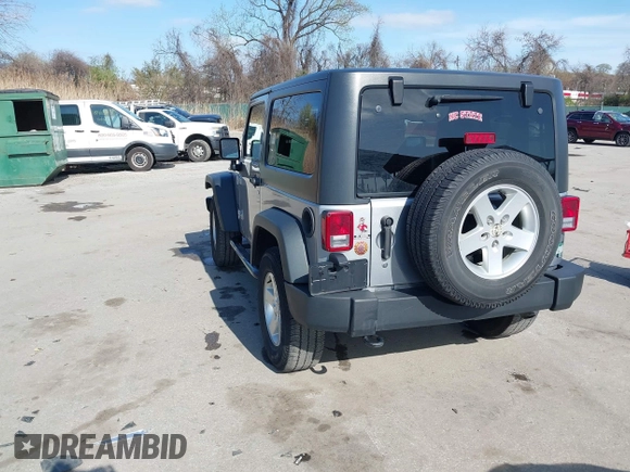 2015 Jeep Wrangler Sport with VIN 1C4GJWAG0FL503254, listed as a IAAI auction lot 41931666 with 115,394 mi miles. Bid and sale history available at carsss.com. Image 3.