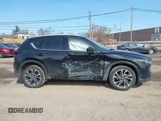 2023 Mazda CX-5 S Premium with VIN JM3KFBDM7P0201038, listed as a IAAI auction lot 41772989 with 26,227 mi miles and . Bid and sale history available at DreamBid. Image 13.