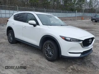 2017 Mazda CX-5 Touring with VIN JM3KFACL8H0205717, listed as a IAAI auction lot 41173725 with 107,604 mi miles. Bid and sale history available at carsss.com. Image 1.