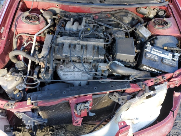 2000 Mazda 626 LX z VIN 1YVGF22CXY5172092, wystawiony jako Copart lot #81960694 z przebiegiem 214 185 mil mil oraz Szkoda całkowita • Salvage title. Historia ofert i sprzedaży dostępna na DreamBid. Obrazek 11.