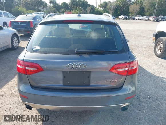 2014 Audi allroad A4 Premium Plus z VIN WA1UFAFL7EA006011, wystawiony jako IAAI lot #41494881 z przebiegiem 70 461 mil mil oraz . Historia ofert i sprzedaży dostępna na DreamBid. Obrazek 16.