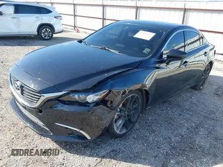 2016 Mazda 6 i Grand Touring with VIN JM1GJ1W50G1478699, listed as a IAAI auction lot 41711211 with 208,720 mi miles and . Bid and sale history available at DreamBid. Image 2.