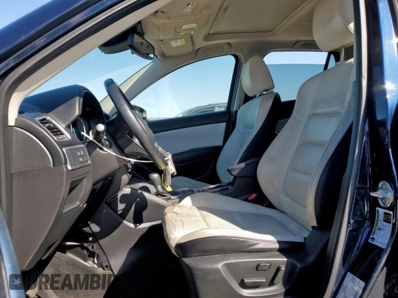 2016 Mazda CX-5 Grand Touring with VIN JM3KE2DY6G0668313, listed as a Copart auction lot 48353535 with 70,085 mi miles and Salvage Title. Bid and sale history available at carsss.com. Image 7.
