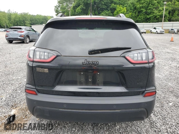 2021 Jeep Cherokee Altitude z VIN 1C4PJLLB2MD169574, wystawiony jako Copart lot #57119285 z przebiegiem 24 301 mil mil oraz Szkoda całkowita • Salvage title. Historia ofert i sprzedaży dostępna na DreamBid. Obrazek 6.