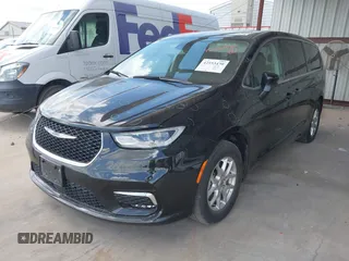 2023 Chrysler Pacifica Touring L with VIN 2C4RC1BG1PR550628, listed as a IAAI auction lot 42553430 with 61,773 mi miles and . Bid and sale history available at DreamBid. Image 2.
