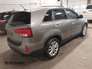 2014 Kia Sorento EX with VIN 5XYKU4A71EG435384, listed as a IAAI auction lot 41607160 with 143,622 mi miles and . Bid and sale history available at DreamBid. Image 4.