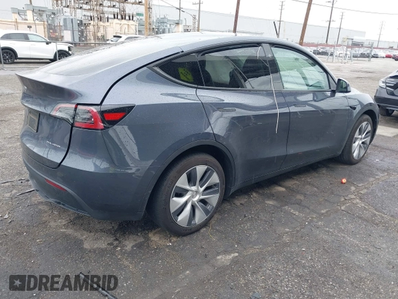 2023 Tesla Model Y Long Range with VIN 7SAYGDEE3PA152683, listed as a IAAI auction lot 41798988 with 14,063 mi miles and . Bid and sale history available at carsss.com. Image 4.
