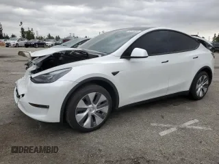 2024 Tesla Model Y Long Range with VIN 7SAYGDEE8RF088808, listed as a Copart auction lot 50406865 with 8,150 mi miles and Salvage title. Bid and sale history available at DreamBid. Image 1.