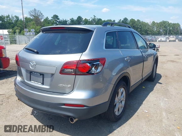 2015 Mazda CX-9 Sport z VIN JM3TB2BA3F0451593, wystawiony jako IAAI lot #42870124 z przebiegiem 196 390 mil mil oraz . Historia ofert i sprzedaży dostępna na DreamBid. Obrazek 4.