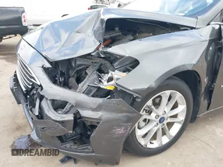 2019 Ford Fusion SE with VIN 3FA6P0LUXKR174476, listed as a IAAI auction lot 42110902 with 33,260 mi miles and . Bid and sale history available at DreamBid. Image 6.