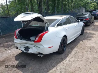 2014 Jaguar XJ with VIN SAJWA2EK8EMV67443, listed as a IAAI auction lot 42483075 with 88,357 mi miles and . Bid and sale history available at DreamBid. Image 4.