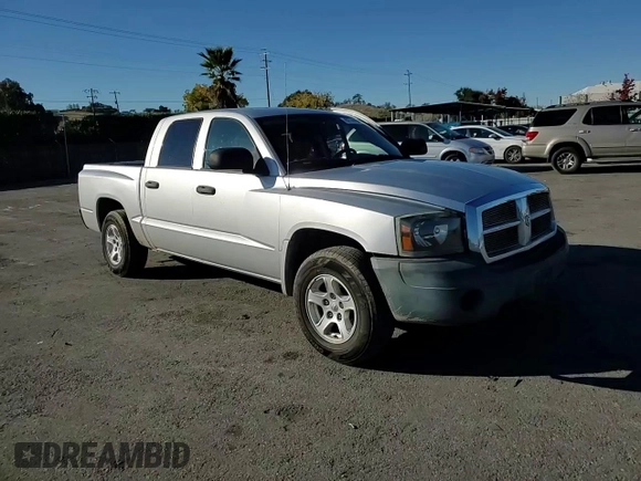 2007 Dodge Dakota SLT with VIN 1D7HE48K47S103248, listed as a Copart auction lot 82744094 with 126,126 mi miles and Salvage Title. Bid and sale history available at DreamBid. Image 11.