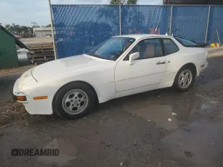 1987 Porsche 944 z VIN WP0AB0948HN473051, wystawiony jako Copart lot #73666654 z przebiegiem 82 580 mil mil oraz Szkoda całkowita • Salvage title. Historia ofert i sprzedaży dostępna na DreamBid. Obrazek 1.