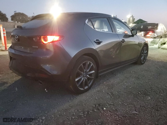 2019 Mazda Mazda3 Hatchback with VIN JM1BPBJM4K1125131, listed as a Copart auction lot 82978154 with 35,555 mi miles and Salvage Title. Bid and sale history available at carsss.com. Image 3.