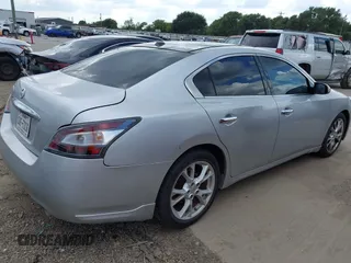 2014 Nissan Maxima SV with VIN 1N4AA5APXEC451832, listed as a IAAI auction lot 42749050 with 137,524 mi miles and . Bid and sale history available at DreamBid. Image 4.