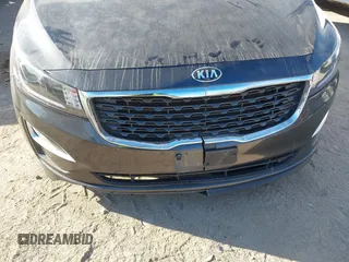 2021 Kia Sedona EX with VIN KNDMB5C19M6671229, listed as a IAAI auction lot 41066675 with 168,393 mi miles. Bid and sale history available at carsss.com. Image 6.