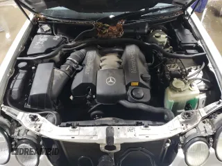 2000 Mercedes-Benz E-Class with VIN WDBJF82J1YX030388, listed as a Copart auction lot 86384974 with 212,596 mi miles and Salvage Title. Bid and sale history available at carsss.com. Image 11.