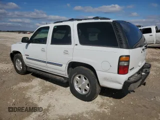 2005 GMC Yukon SLT with VIN 1GKEK13TX5R118933, listed as a Copart auction lot 87057744 with 213,900 mi miles and Salvage Title. Bid and sale history available at carsss.com. Image 2.