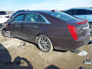 2017 Cadillac XTS with VIN 2G61L5S31H9164023, listed as a IAAI auction lot 41408290 with 59,695 mi miles and . Bid and sale history available at DreamBid. Image 3.