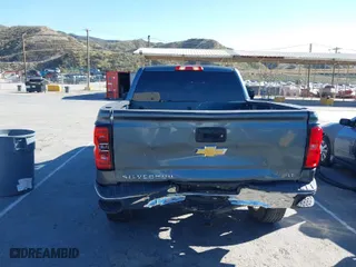 2014 Chevrolet Silverado 1500 LT with VIN 3GCPCREH7EG299238, listed as a IAAI auction lot 41831255 with 129,850 mi miles. Bid and sale history available at carsss.com. Image 15.